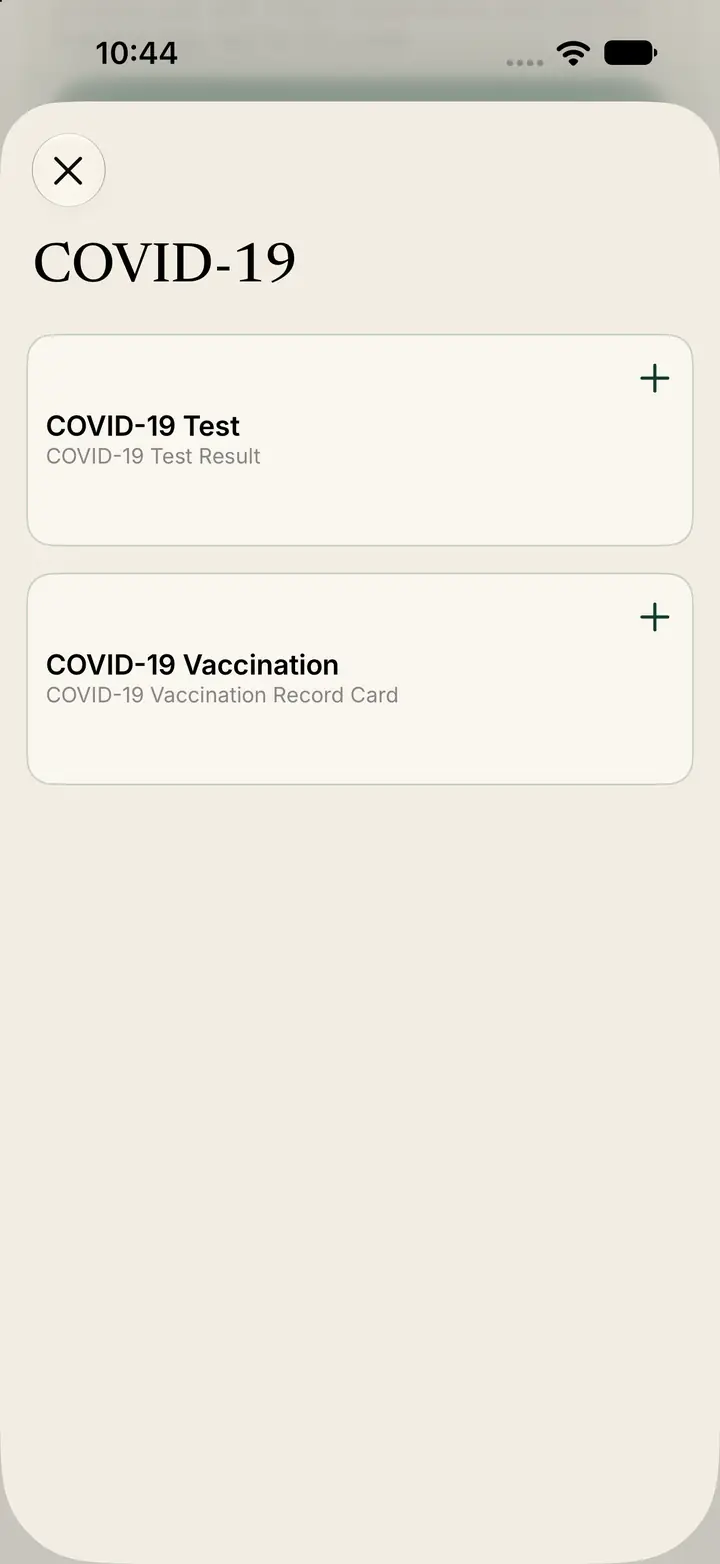 COVID-19 types: a test result and a vaccination record card.